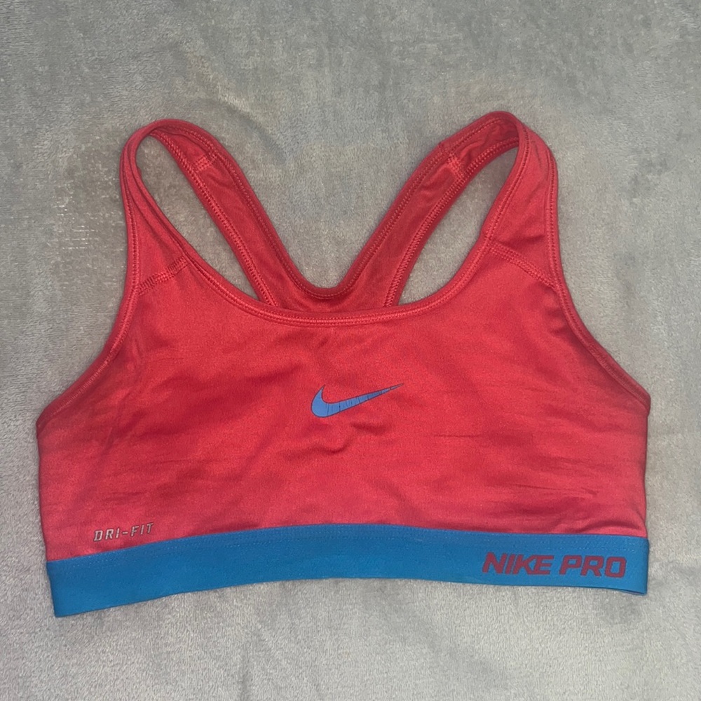 pink and blue nike sports bra
